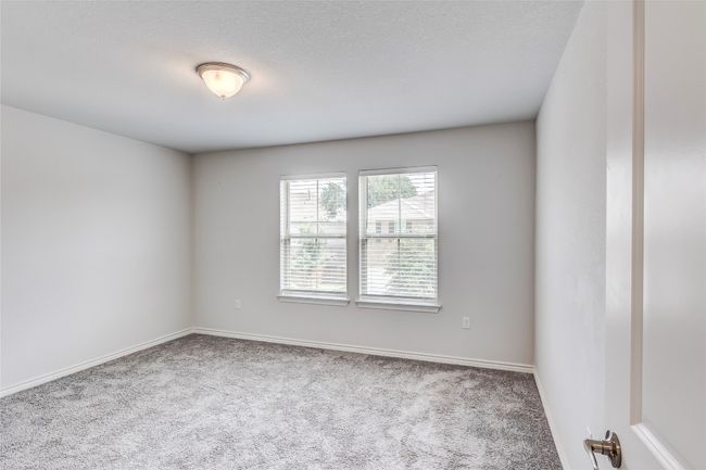 Spare room with carpet and baseboards | Image 26