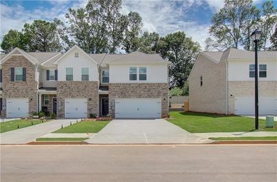 520 Payne Drive, Townhouse with 3 bedrooms, 2 bathrooms and null parking in Mcdonough GA | Image 1