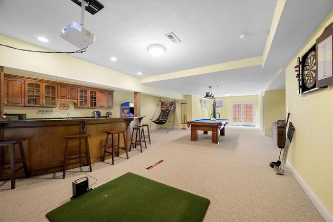 The lower level is finished and offers so much entertaining space! | Image 34