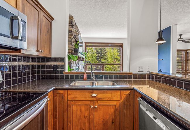313 - 80 Dyrgas Gate, Townhouse with 3 bedrooms, 3 bathrooms and 2 parking in Canmore AB | Image 23