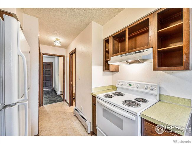 Kitchen in 2 Bedroom Side Next to Dining Area | Image 28