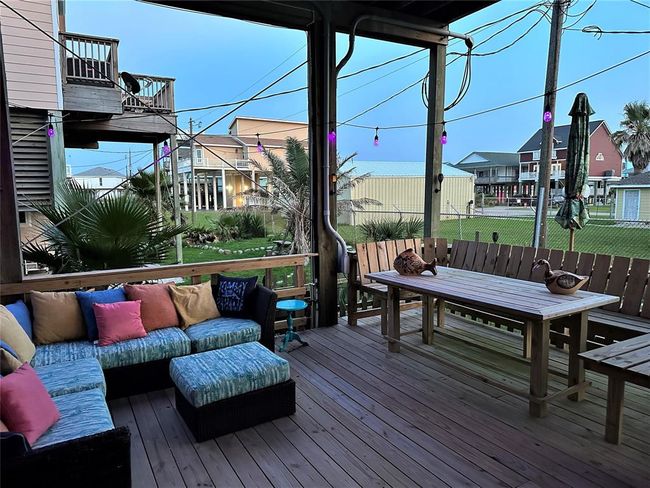 Lower deck is perfect when it's really hot, upstairs, there is a titli bar in the golf cart garage...pictures to come. | Image 24