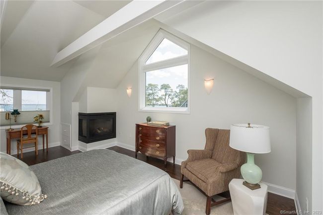 1st of the 2nd floor bedrooms has an en-suite w/ gas fireplace | Image 30