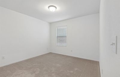 Spacious secondary bedroom *Photos of furnished model. Not actual home. Representative of floor plan. Some options and features may vary | Image 3