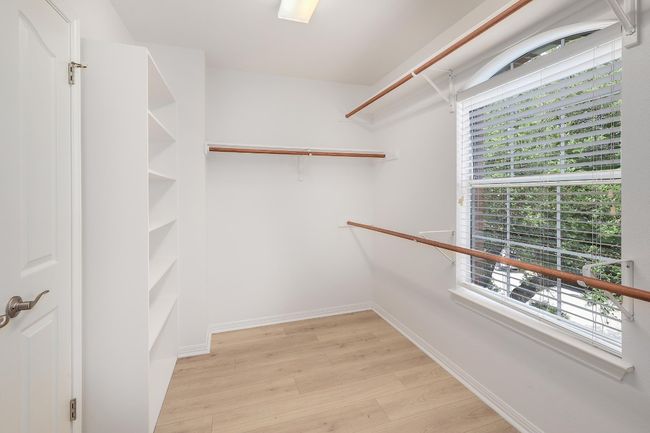 Spacious primary walk-in closet | Image 23