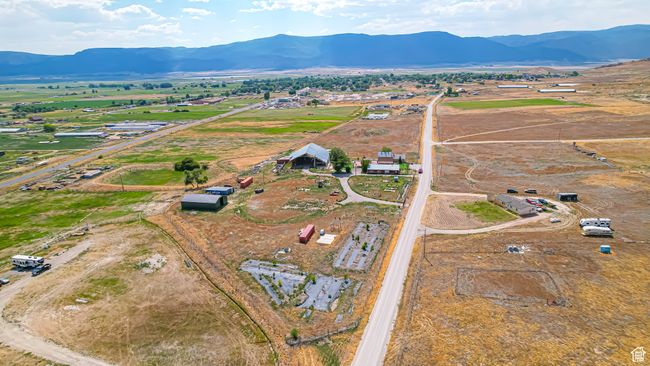 Birds eye view of property featuring a rural view and a mountain view | Image 13