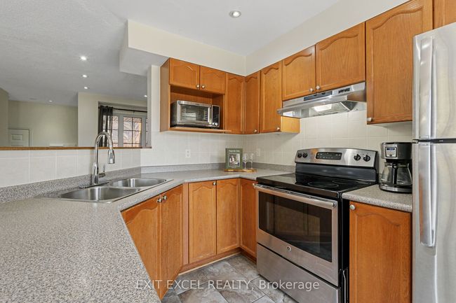 1509 Demeter St, House attached with 3 bedrooms, 2 bathrooms and 2 parking in Orleans ON | Image 13