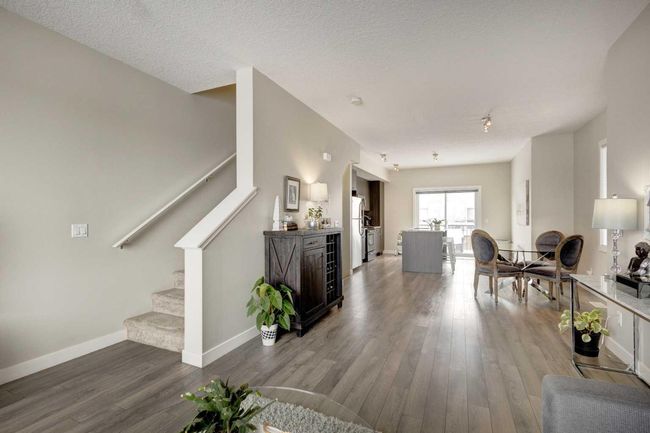 107 - 2802 Kings Heights Gate Se, Home with 3 bedrooms, 2 bathrooms and 2 parking in Airdrie AB | Image 4