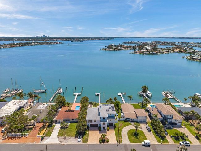 Aerial view of home centered here, showcasing the wide open waters of Boca Ciega Bay. Two islands are within easy paddling distance! | Image 11