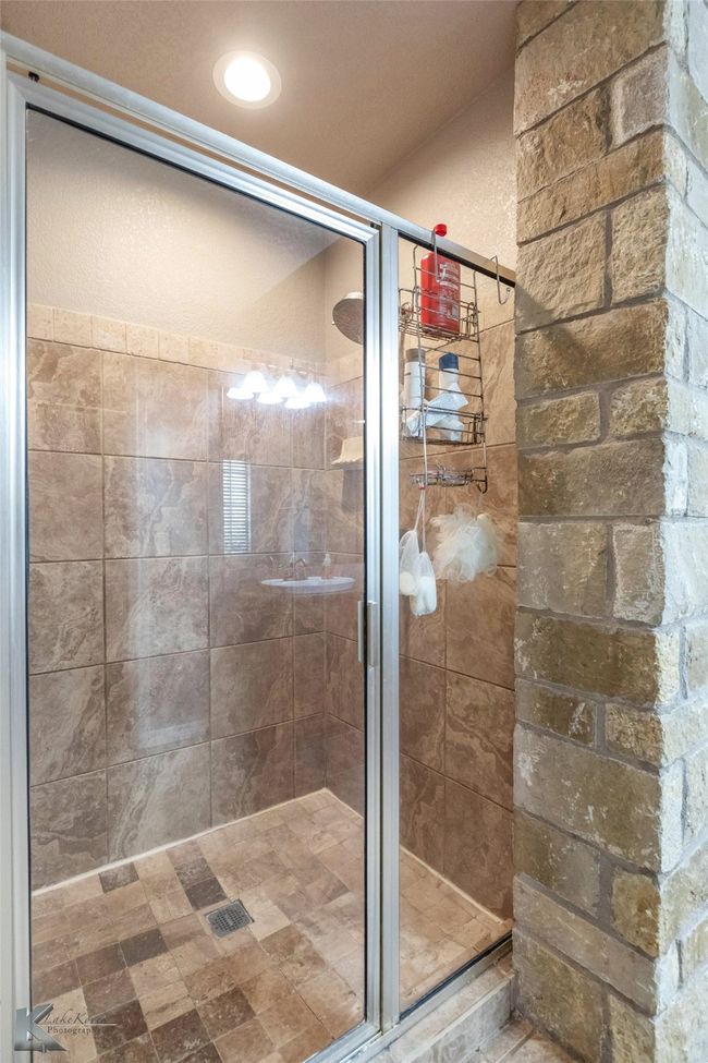 Full bathroom featuring a shower stall | Image 16