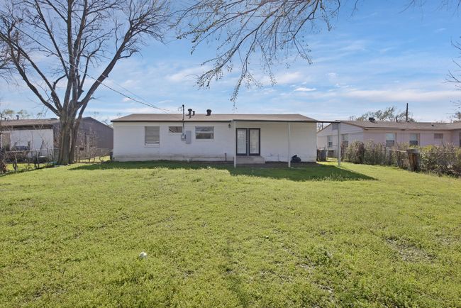 Back of house featuring a lawn and a fenced backyard | Image 23
