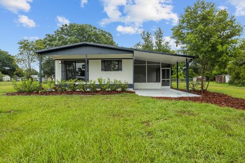 403 Clearwater Ave, POLK CITY, FL, 33868-9176 | Card Image