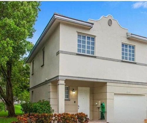 2032 Freeport Ln, Riviera Beach, FL, 33404-6462 | Card Image