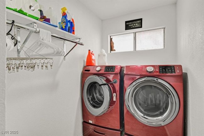 Laundry room featuring washer and dryer and laundry area | Image 25