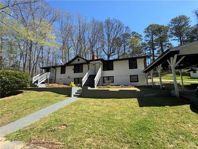 5410 Camp Trail Road, House other with 3 bedrooms, 3 bathrooms and 2 parking in Fairburn GA | Image 2