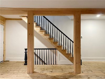 Staircase featuring hardwood / wood-style flooring | Image 2