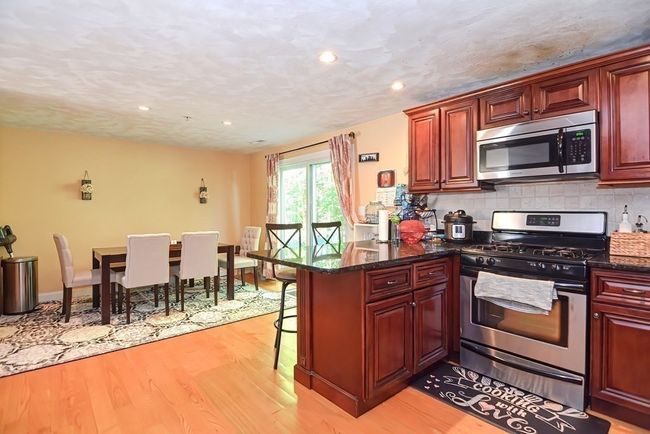 UNIT-4 - 1 Olson St, House attached with 2 bedrooms, 3 bathrooms and 1 parking in Wilmington MA | Image 9