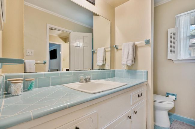Undeniable character in this primary bath | Image 32