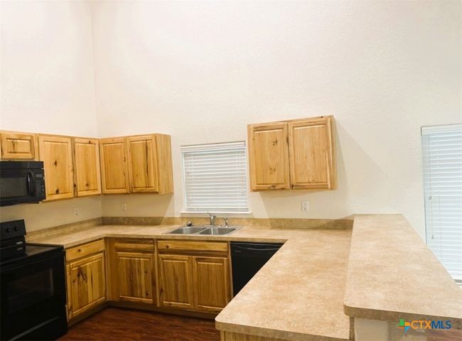 Great kitchen, with a great open concept floor plan. | Image 9