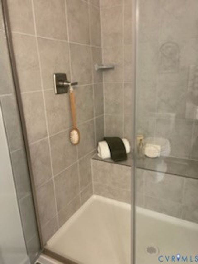 Full bathroom featuring a stall shower | Image 16