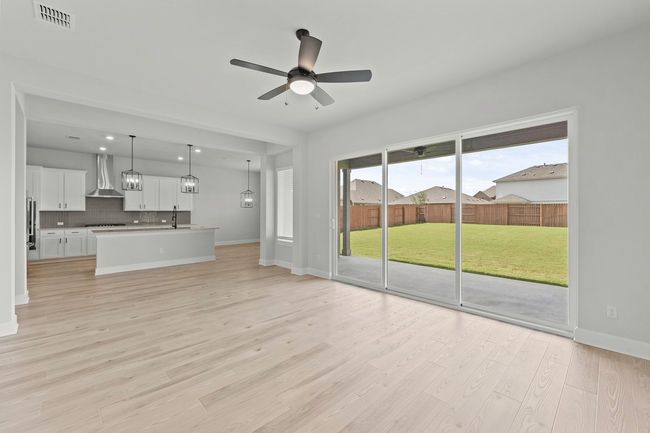 This home has a sprawling, open entertaining area. | Image 4