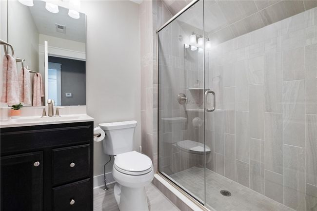 Third floor full bath with tiled shower. | Image 32
