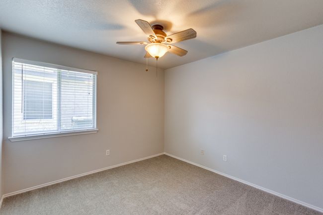 Bedroom #1 Unfurnished room with carpet and ceiling fan | Image 20