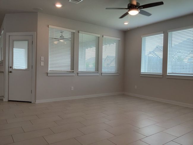 Living room featuring a ceiling fan and recessed lighting | Image 12