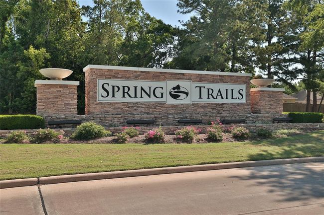 The welcoming neighborhood sign marks the entrance to a community that offers a wealth of amenities, including walking trails, sports park, a clubhouse with a sparkling pool, and a playgrounds for the whole family to enjoy. It’s a place where neighbors connect and families thrive. | Image 29