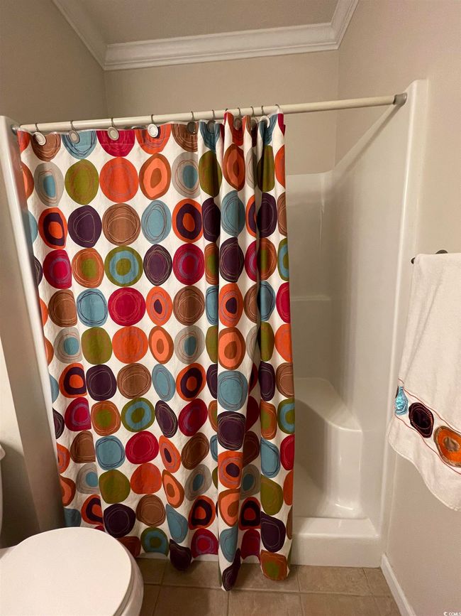 Main Bath features a Walk In Shower insert, Xtra Large Linen Closet (behind door) and Upgraded, Comfort Height Vanity with Granite. | Image 22