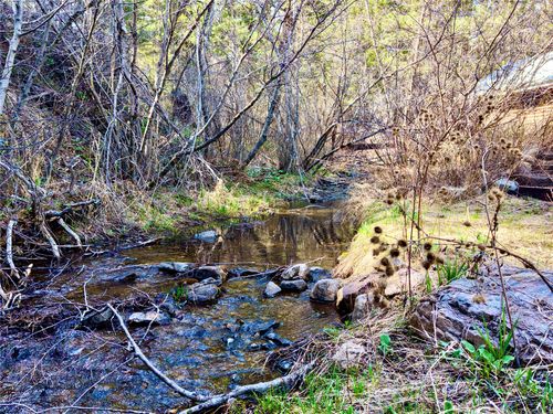 3925 Little Wolf Creek Rd, Wolf Creek, MT, 59648-8530 | Card Image