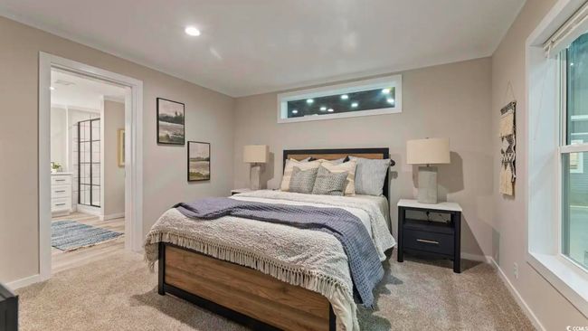 Carpeted bedroom with baseboards | Image 20