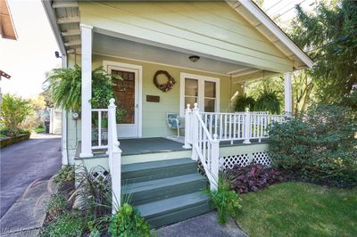 View of exterior entry featuring a porch | Image 2