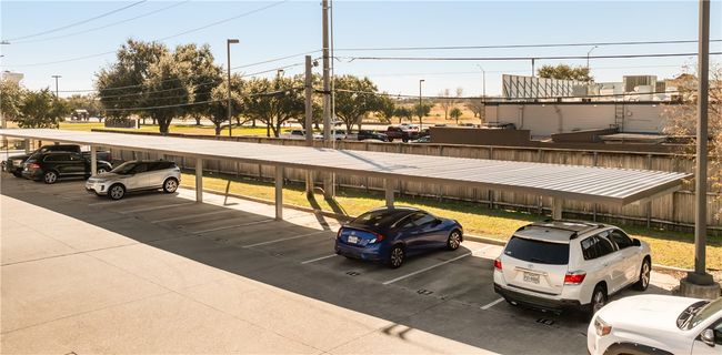 View of vehicle parking featuring a carport | Image 32
