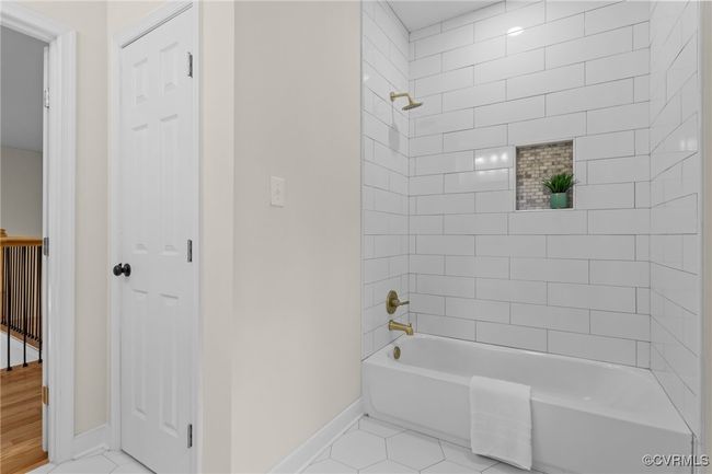 Bathroom with tile patterned floors and shower combination | Image 30