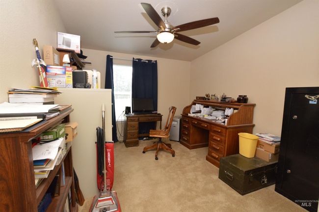 Office area featuring ceiling fan, light carpet, and lofted ceiling | Image 23