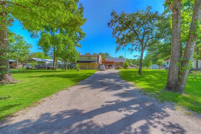 Ton of parking space with carport as well as paved driveway | Image 16