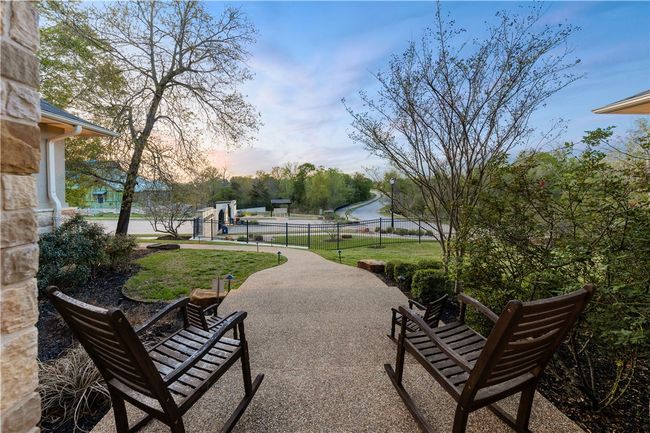 Surrounding community featuring a patio, a lawn, and fence | Image 33