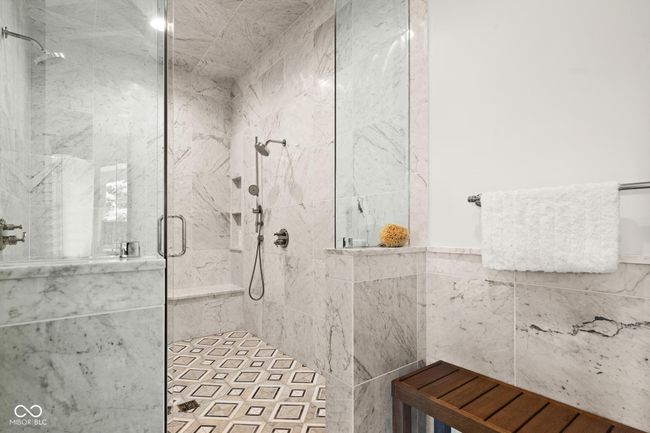 primary bathroom featuring a large shower walk-in shower | Image 29