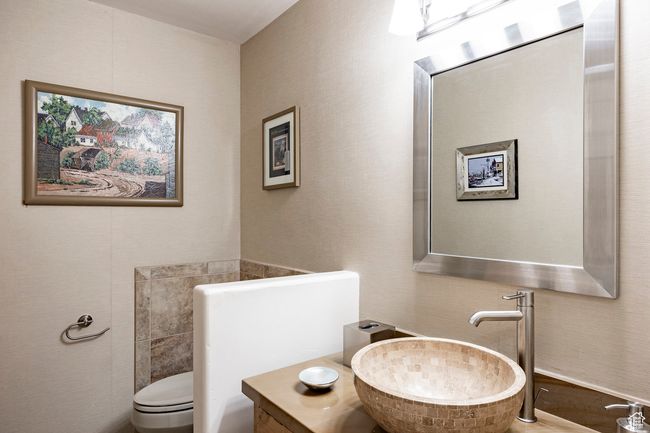 Main floor bedroom with light carpet | Image 14