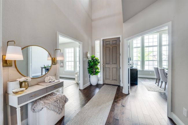 Foyer entrance featuring baseboards and dark wood-style flooring | Image 4
