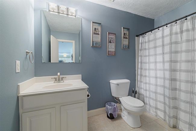 Full bath located downstairs. | Image 15