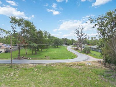 View of property's community featuring a yard | Image 2