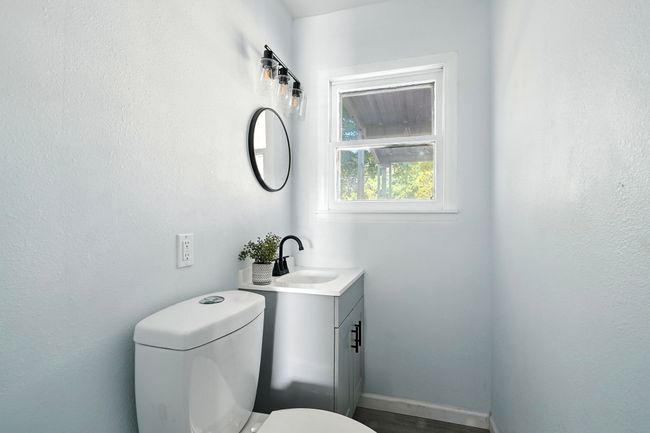 Bathroom with vanity and toilet | Image 21