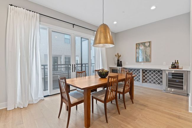 Dining Space with Built-ins and 2 Wine Refrigerators | Image 19