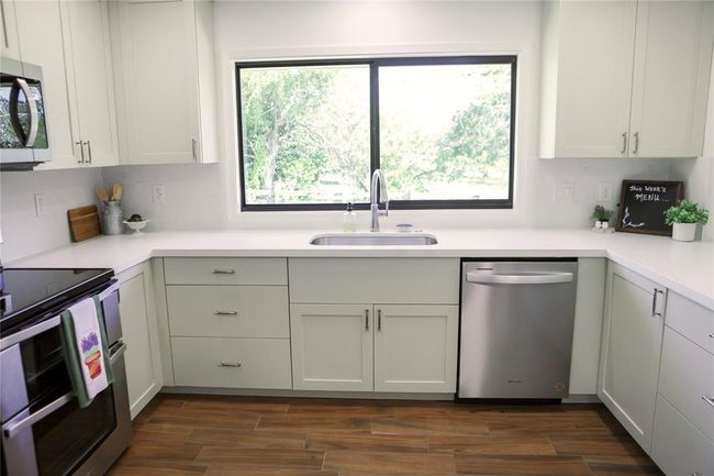 Brand new appliances with 5 year warranty will convey | Image 11