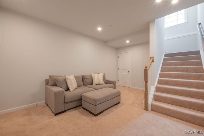 Basement/ game room with light carpet, baseboards, and recessed lighting | Image 27