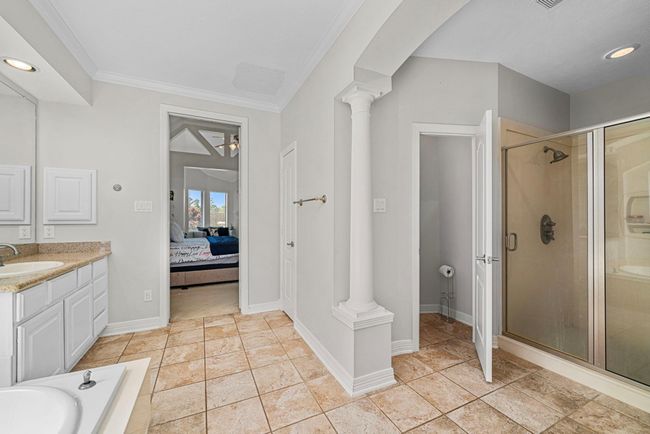 Luxury designed Primary Bathroom equipped inviting walk-in shower | Image 20