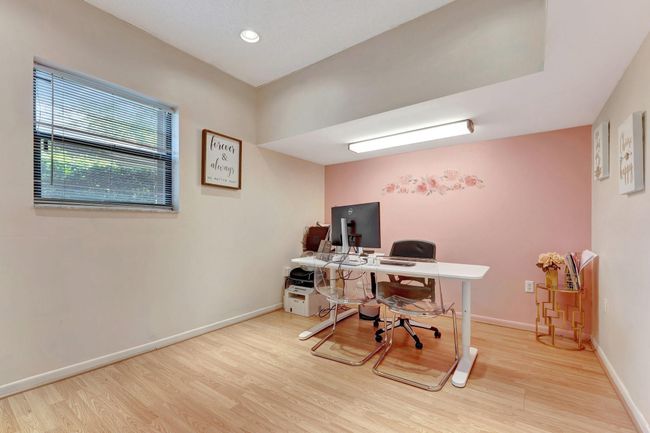 2 car garage converted to office/bedroom with simple drywall very easy to convert back. A/C vents to office/bedroom w/closet and window. | Image 24