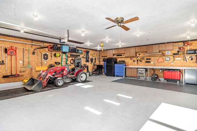 Welcome to the ULTIMATE garage glam workshop! 720 sf of customized workshop garage space. Don't lie...you're drooling. This could be yours. | Image 8